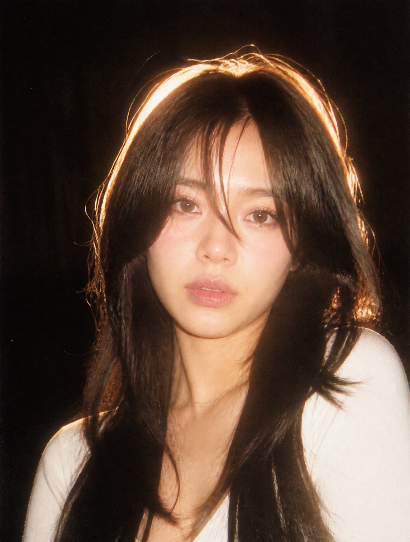 A nostalgic 90s film photography style portrait. Harsh direct camera flash lighting, strong contrast, subtle film grain AI photo prompt example